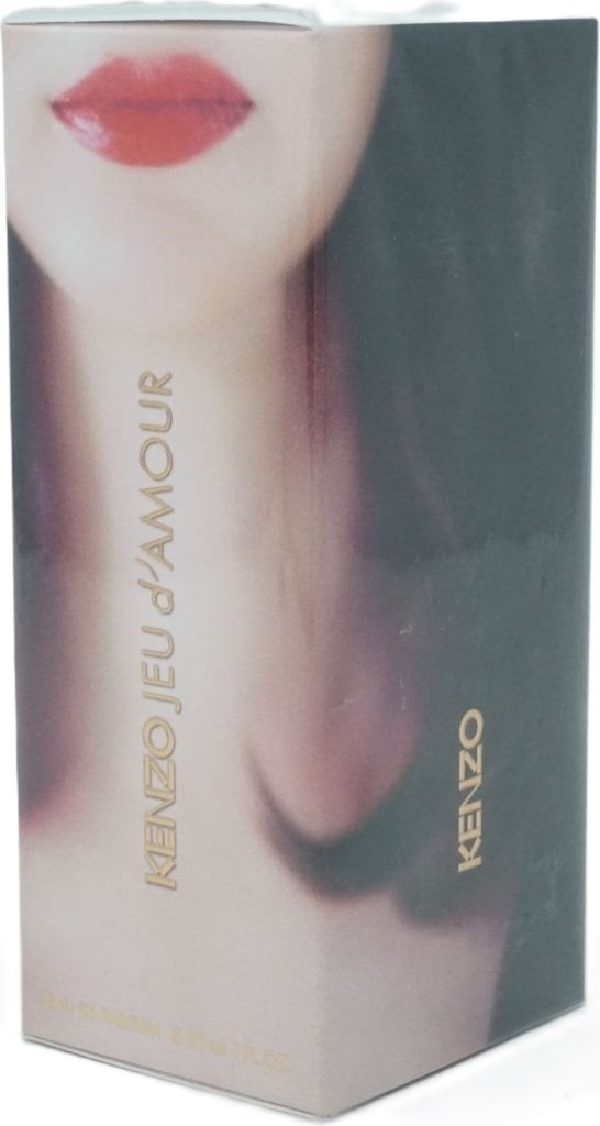 A product box for perfume featuring a close-up of a woman's lips and shoulders.