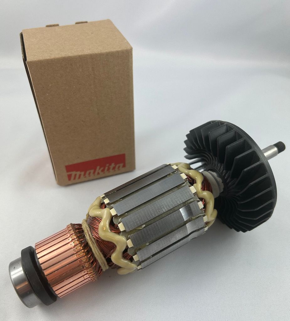 A new Makita armature rotor with its original packaging box.