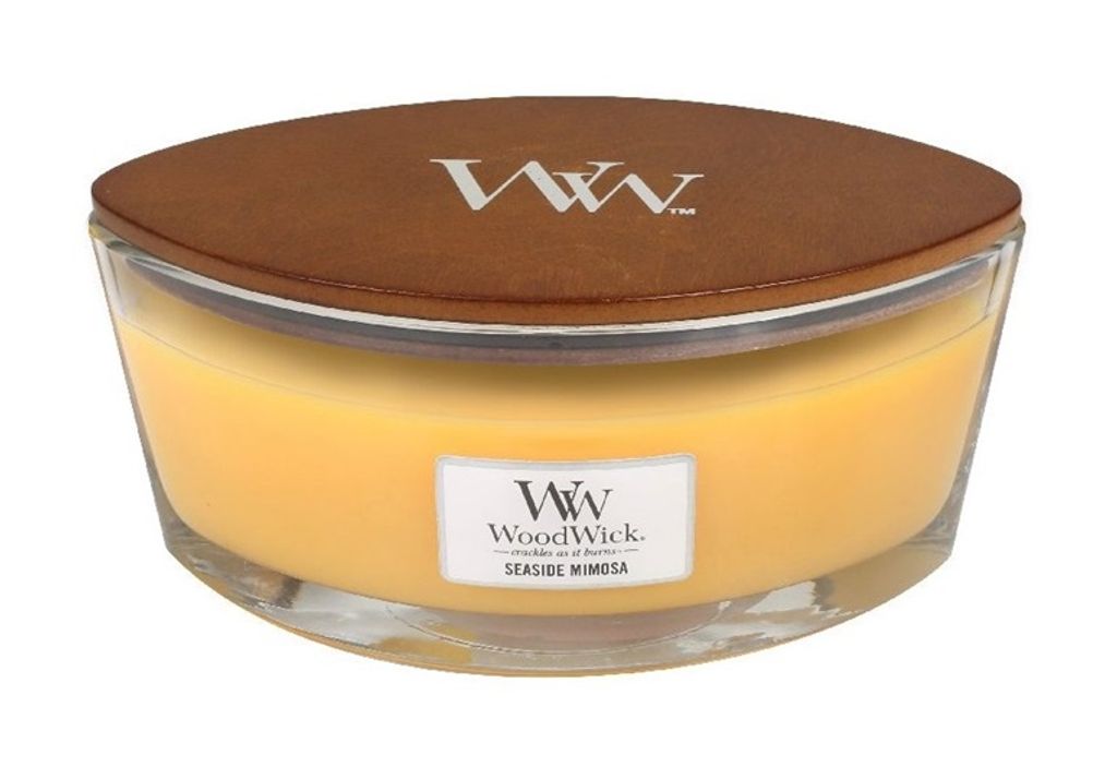 A WoodWick candle with a wooden lid and a label.