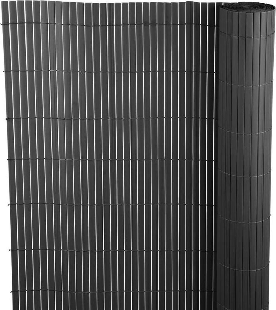 A rolled-up and unrolled fence screen made of vertical slats.
