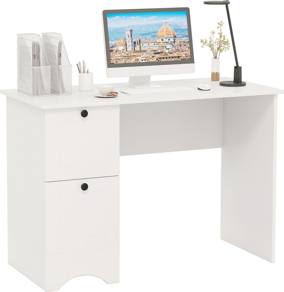 A white desk with a computer, lamp, and office supplies.