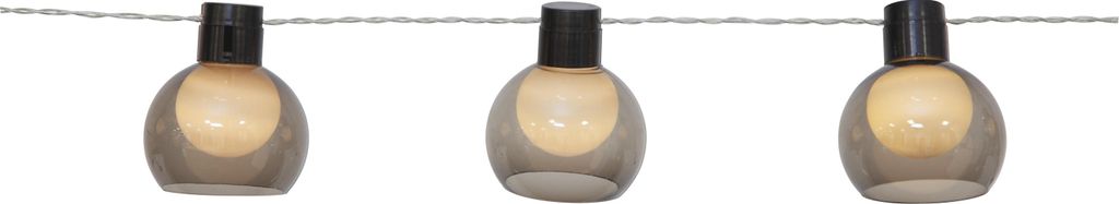 A string of three solar-powered lights with smoky gray glass shades and black caps, suspended on a thin wire against a white background.