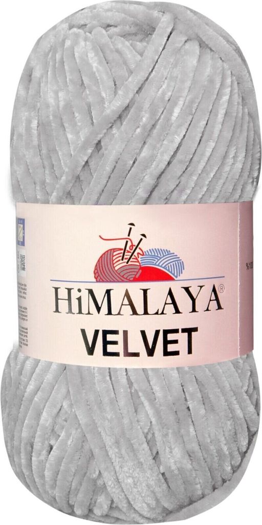 A ball of grey velvet yarn on a white background.