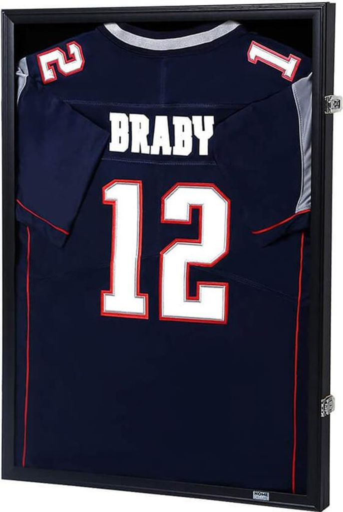 A framed football jersey is displayed.