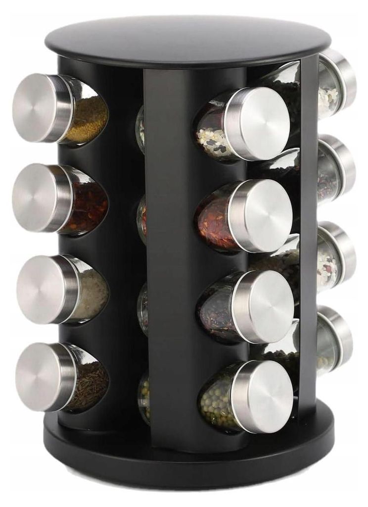A rotating spice rack with 16 glass jars filled with various spices.