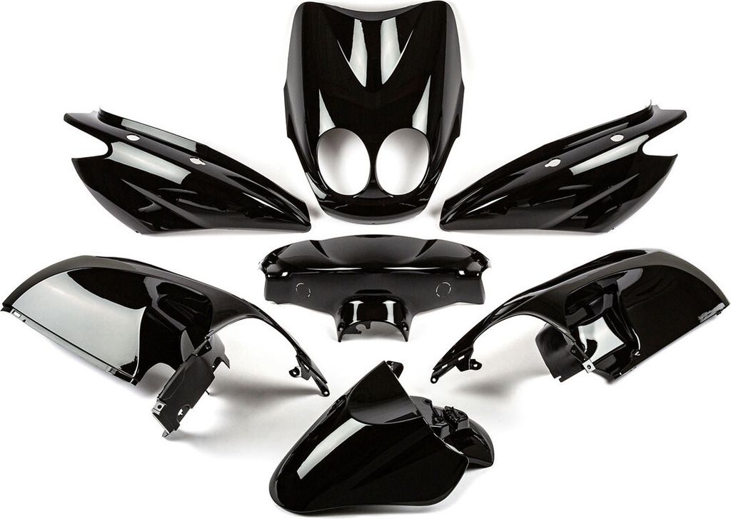 A set of black motorcycle fairing parts arranged on a white background.