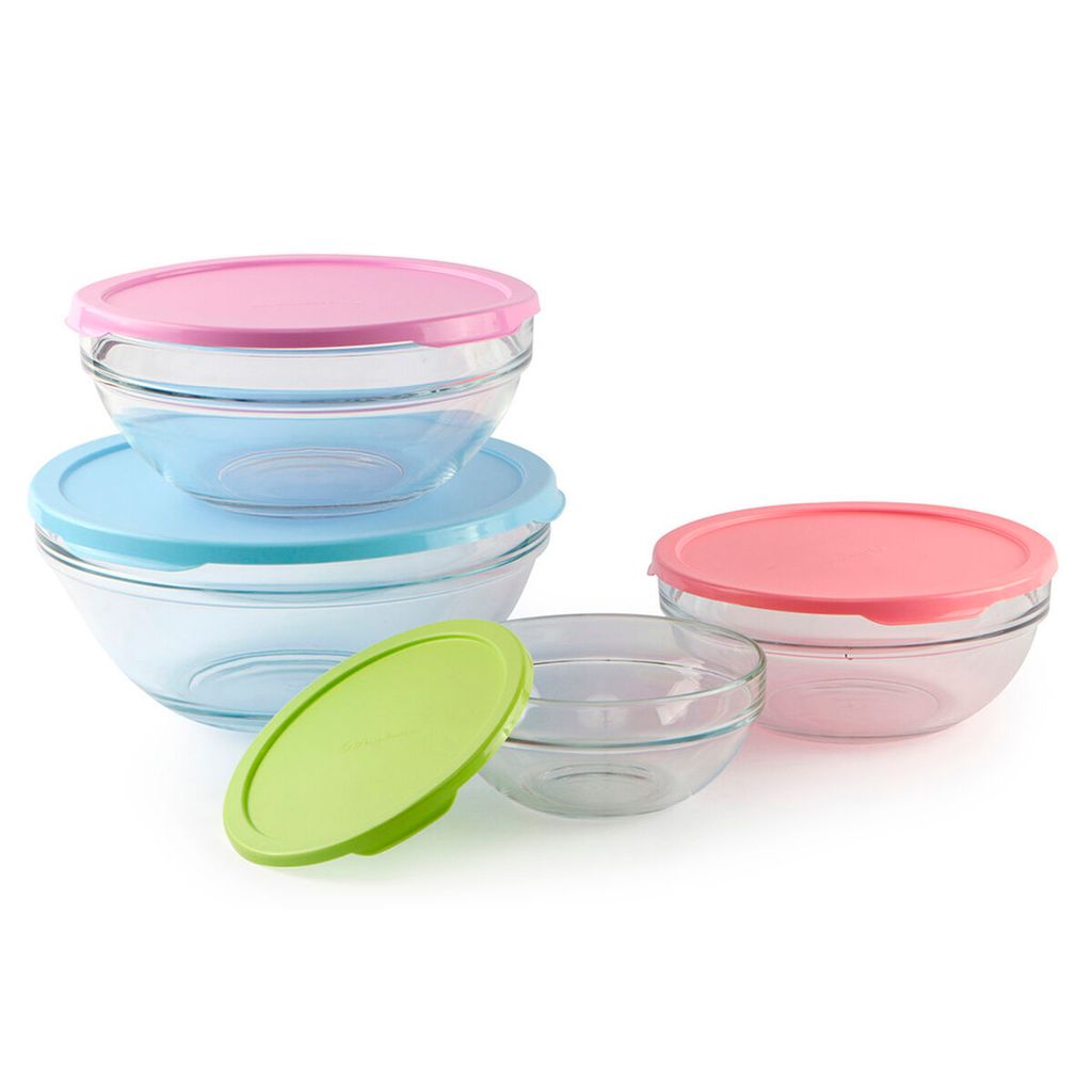 A set of glass bowls with colorful lids on a white background.