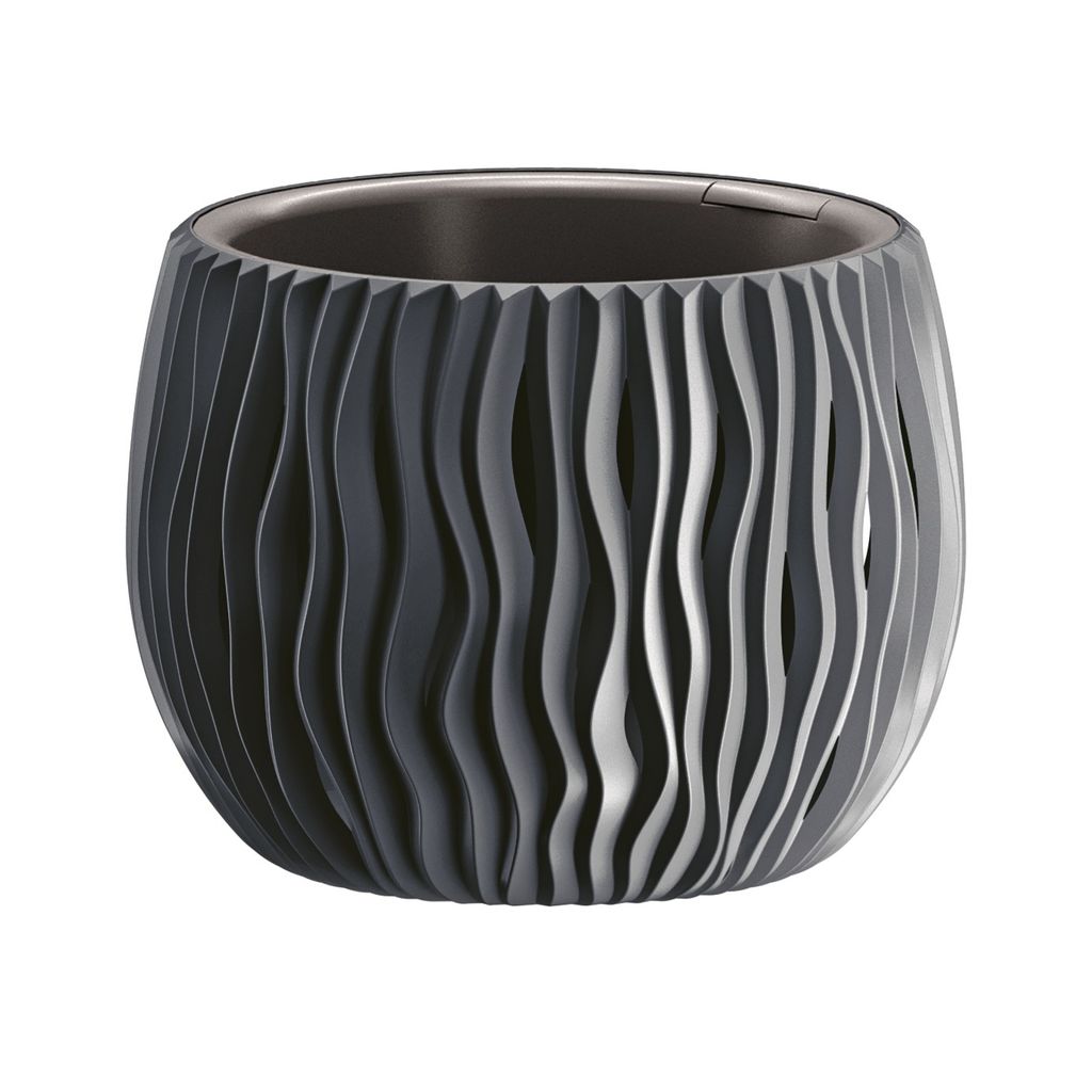 A dark gray, textured planter pot with a wavy, ribbed design.