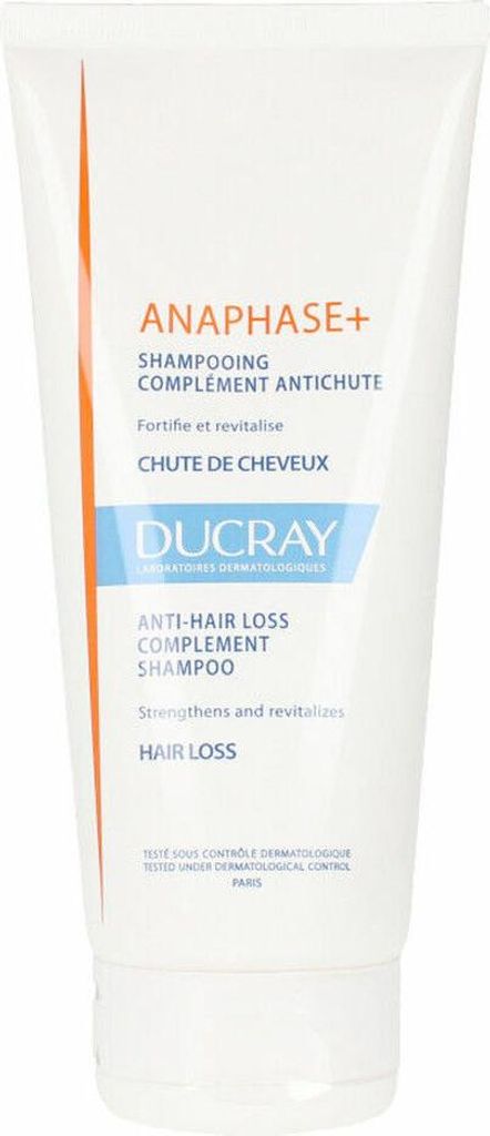 A white tube of shampoo with text and branding.
