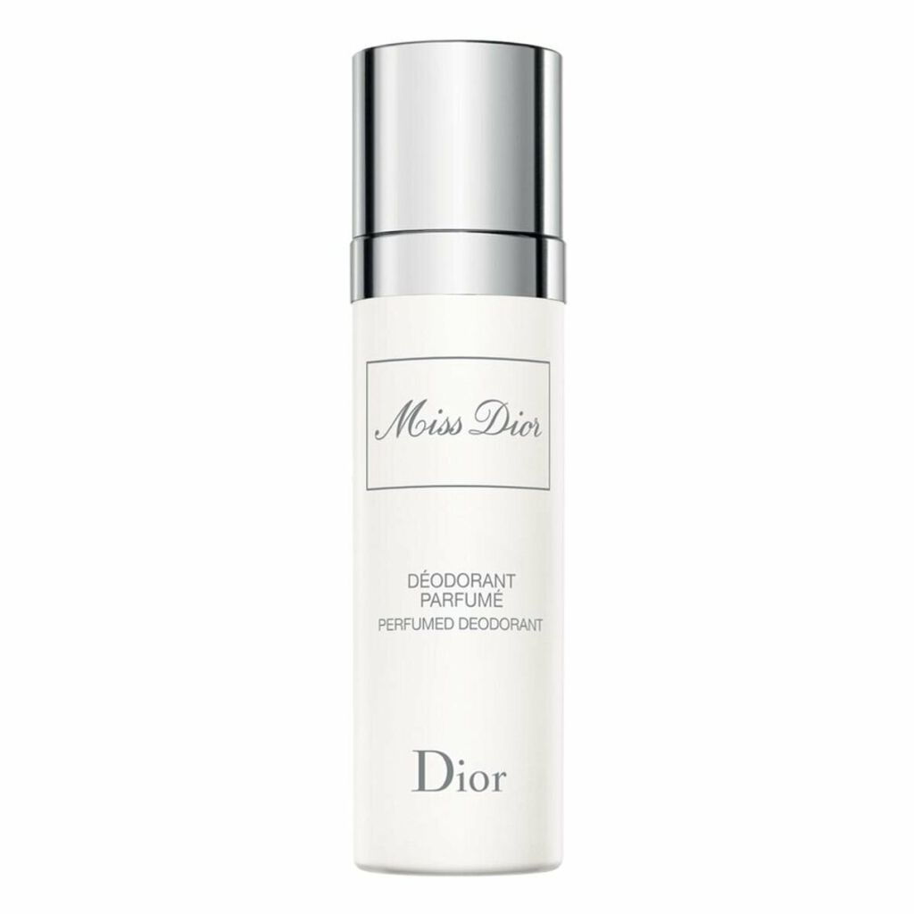 A product shot of a white deodorant spray with a silver cap.