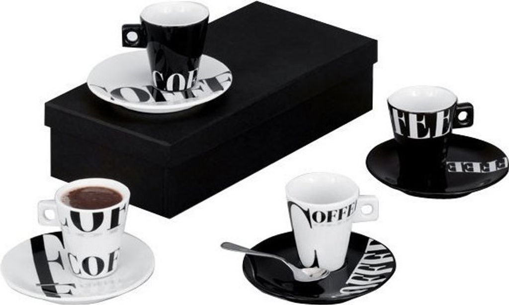 A set of espresso cups and saucers with a black box in the background.