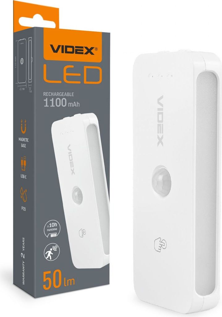 A product shot of a white LED night light and its packaging.