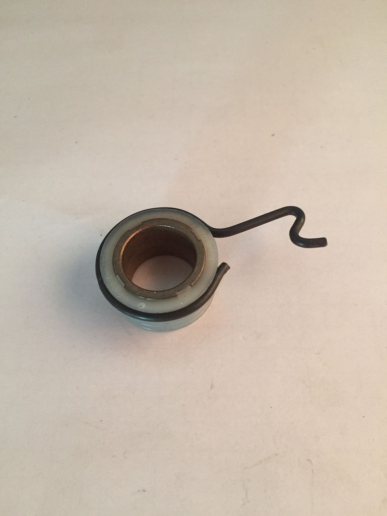 A single mechanical part, likely a spring or bearing assembly, is shown against a plain white background.