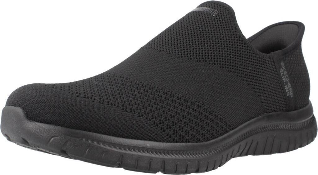 A black Skechers slip-on sneaker is shown from a side angle against a white background.
