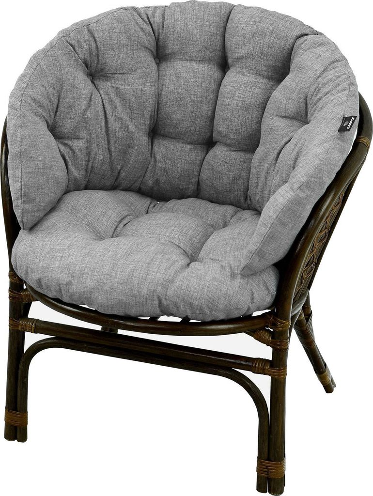A close-up studio shot of a papasan chair with a grey cushion.