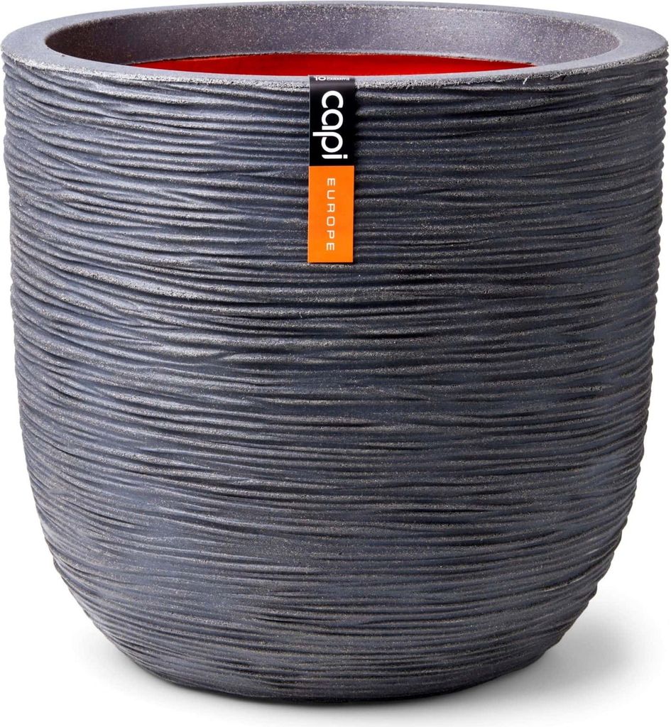 A dark gray textured planter pot with a red interior and an orange tag attached.