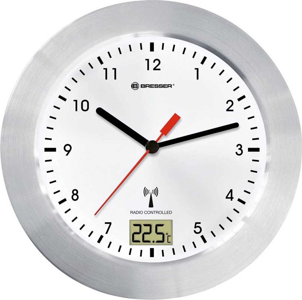 A close-up view of a white and silver radio-controlled wall clock with a digital temperature display.