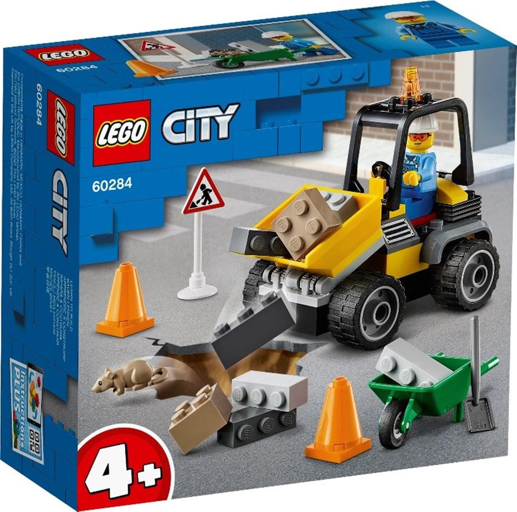 A LEGO City construction set box featuring a front loader, construction worker, and various building elements.