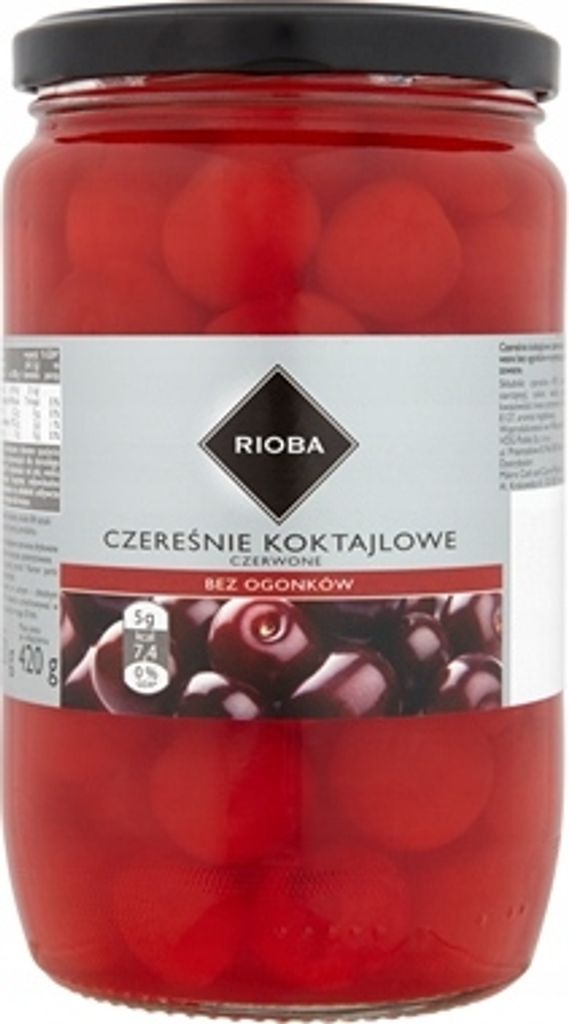 A jar of cocktail cherries on a white background.
