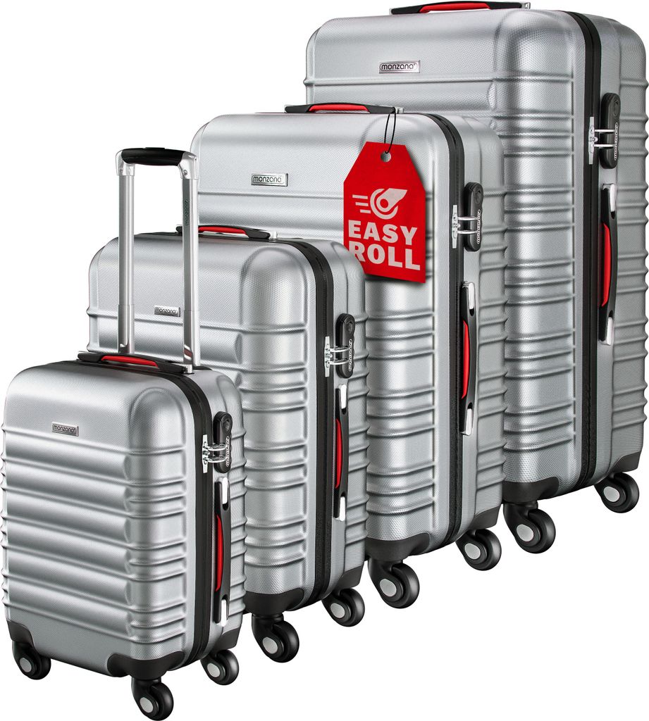 A set of four silver suitcases of varying sizes, arranged diagonally.