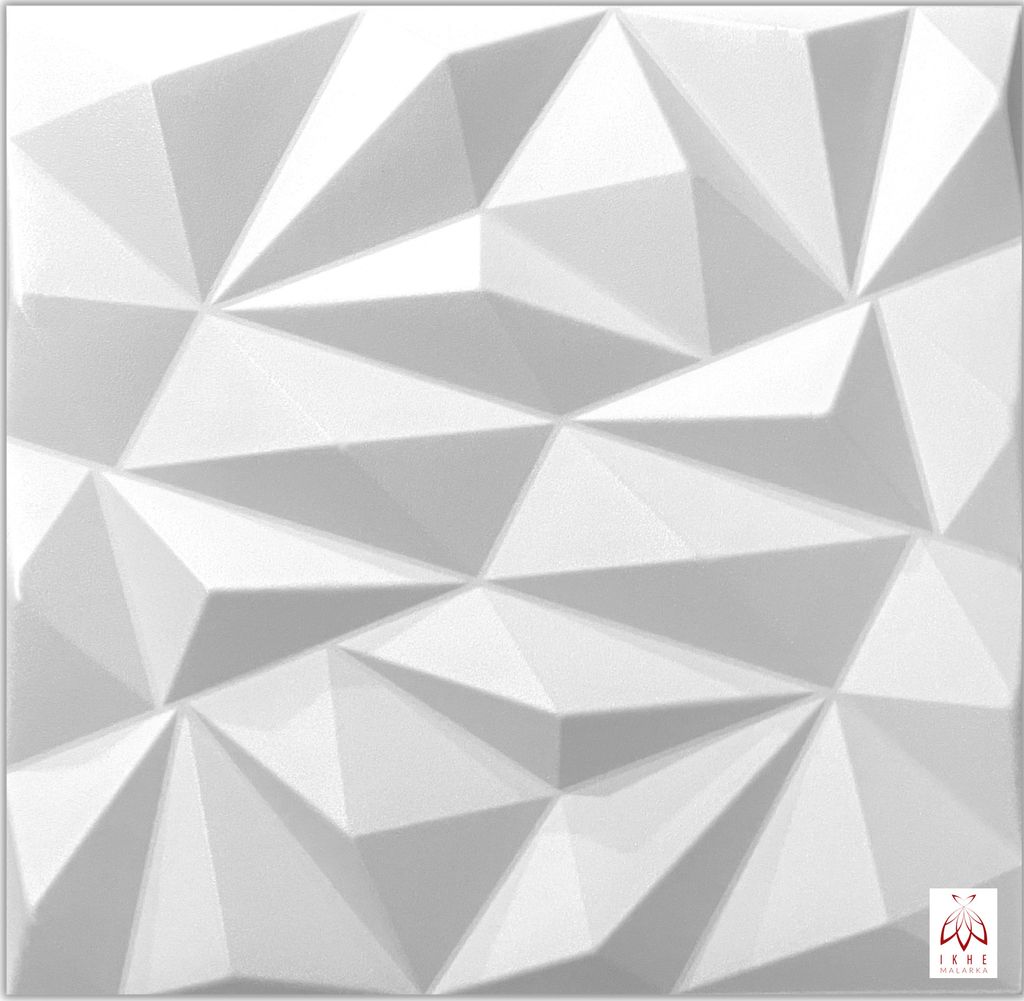 A white, geometric, 3D wall panel.