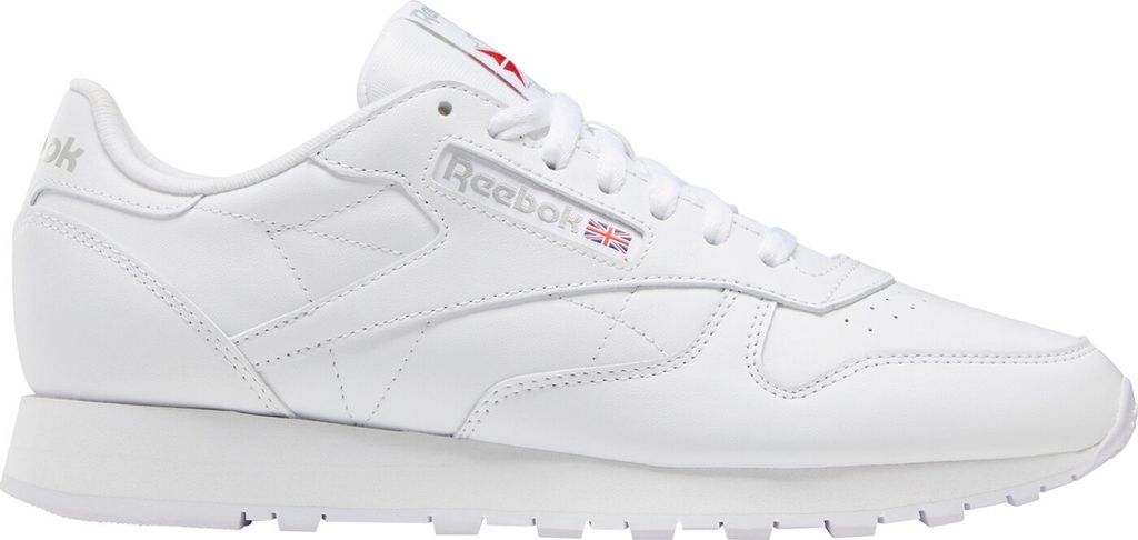 A side view of a white Reebok Classic Leather sneaker.