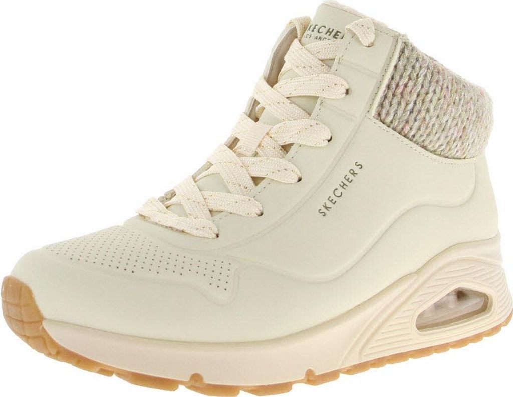 A single cream-colored Skechers bootie is shown against a white background.