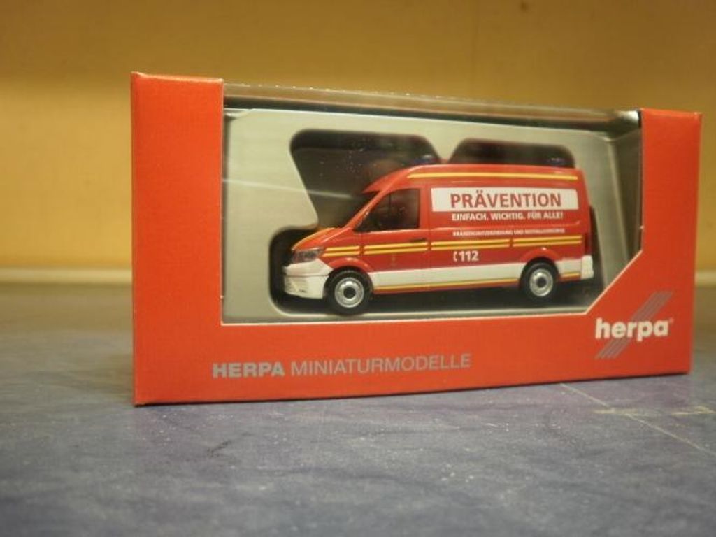Herpa MAN TG-E Kasten Hochdach FFW München 094054