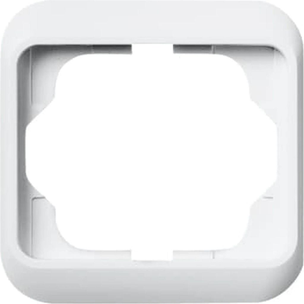A white frame for an electrical outlet or switch.