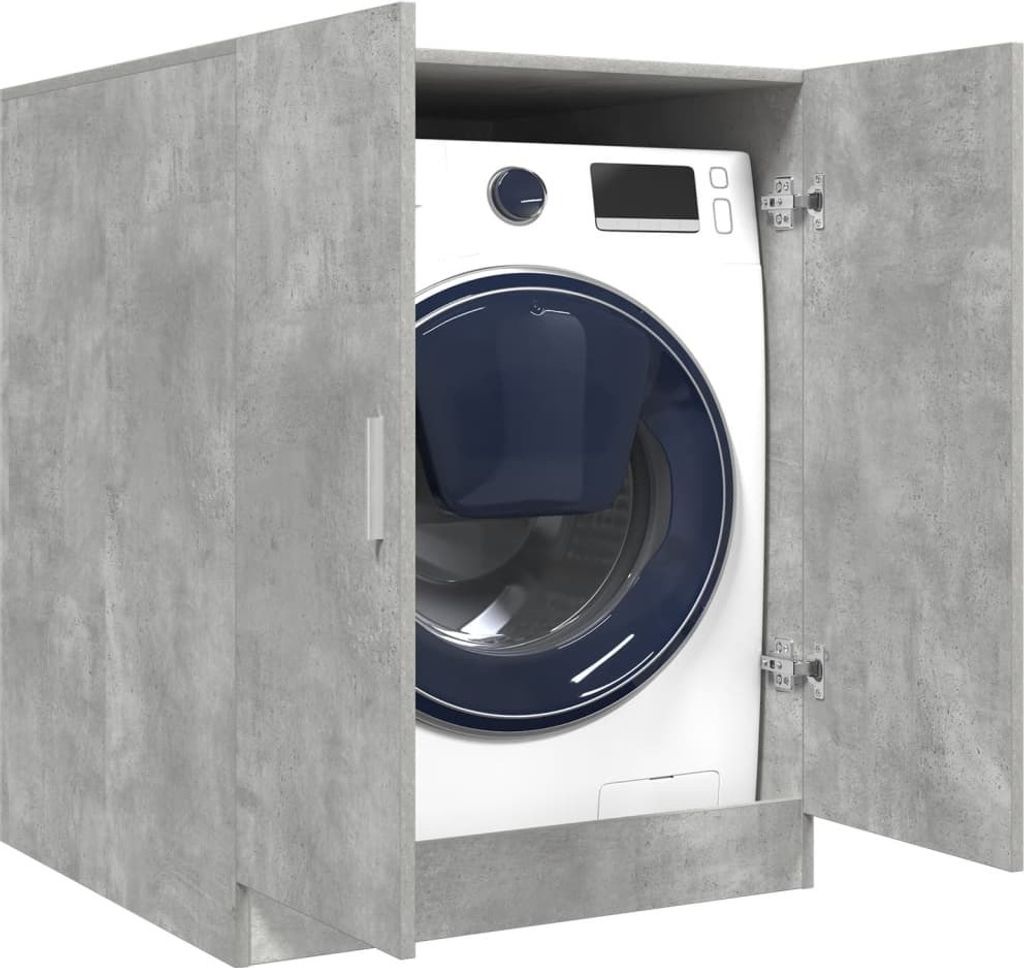 A washing machine inside a cabinet.