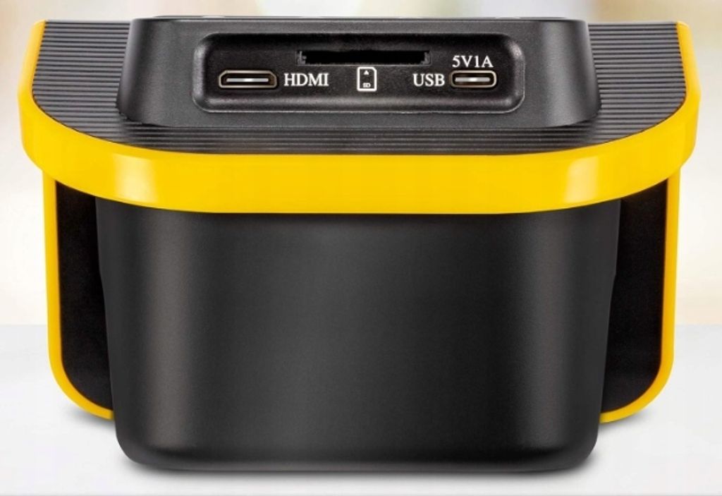 The back of a black and yellow electronic device with ports visible.