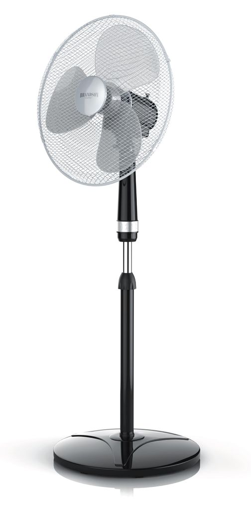 A black and silver stand fan is shown against a white background.