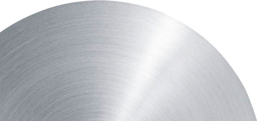 A close-up view of a brushed metal surface with concentric circular patterns.