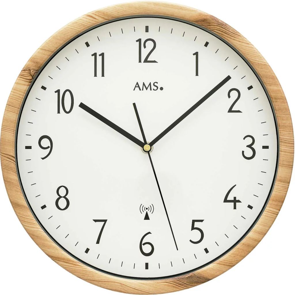 A close-up, front-facing view of a round wall clock with a wooden frame.