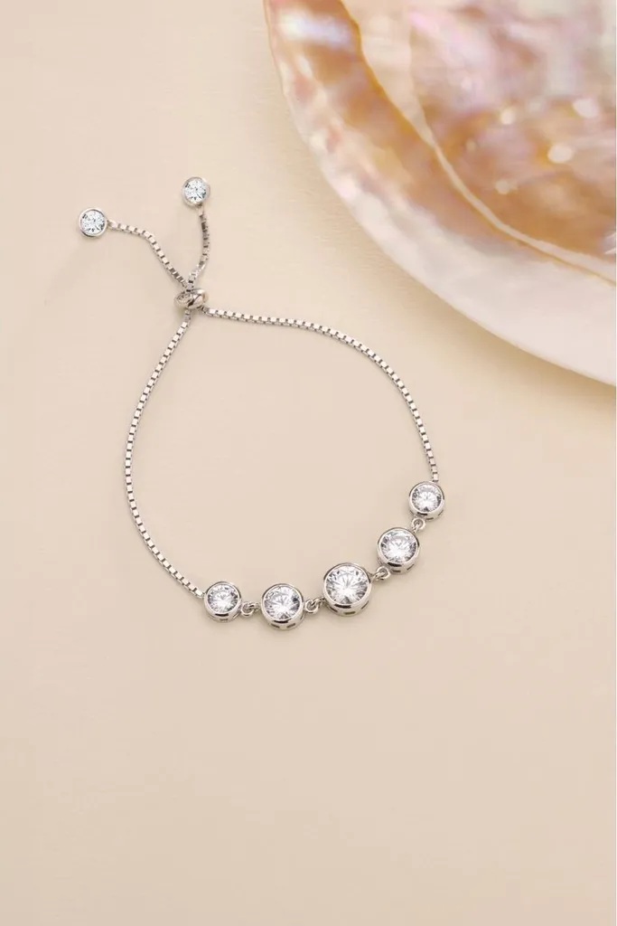 Bracelet en argent 925 rhodié réglable orné de cinq zircons brillants