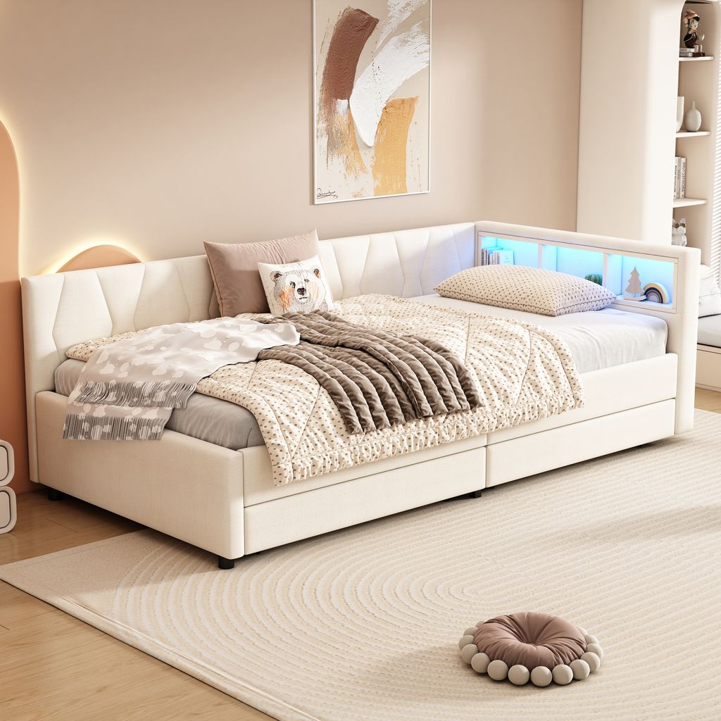 A bedroom scene with a daybed, pillows, and blankets.