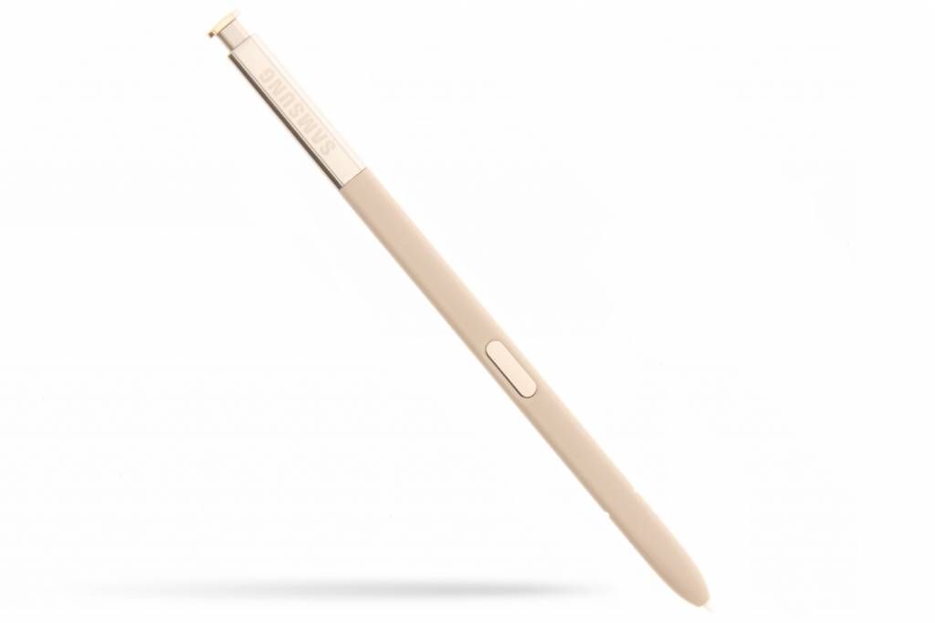 A gold Samsung S Pen stylus is shown against a white background.