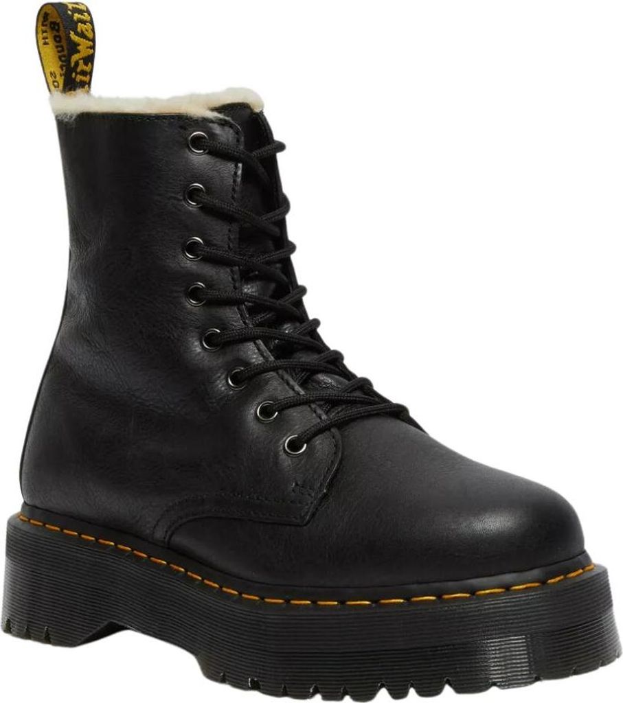A studio shot of a single black boot.