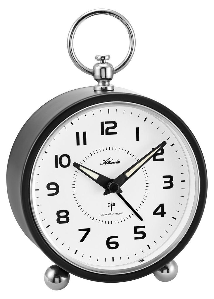 A black alarm clock with a white face and silver accents, set against a white background.
