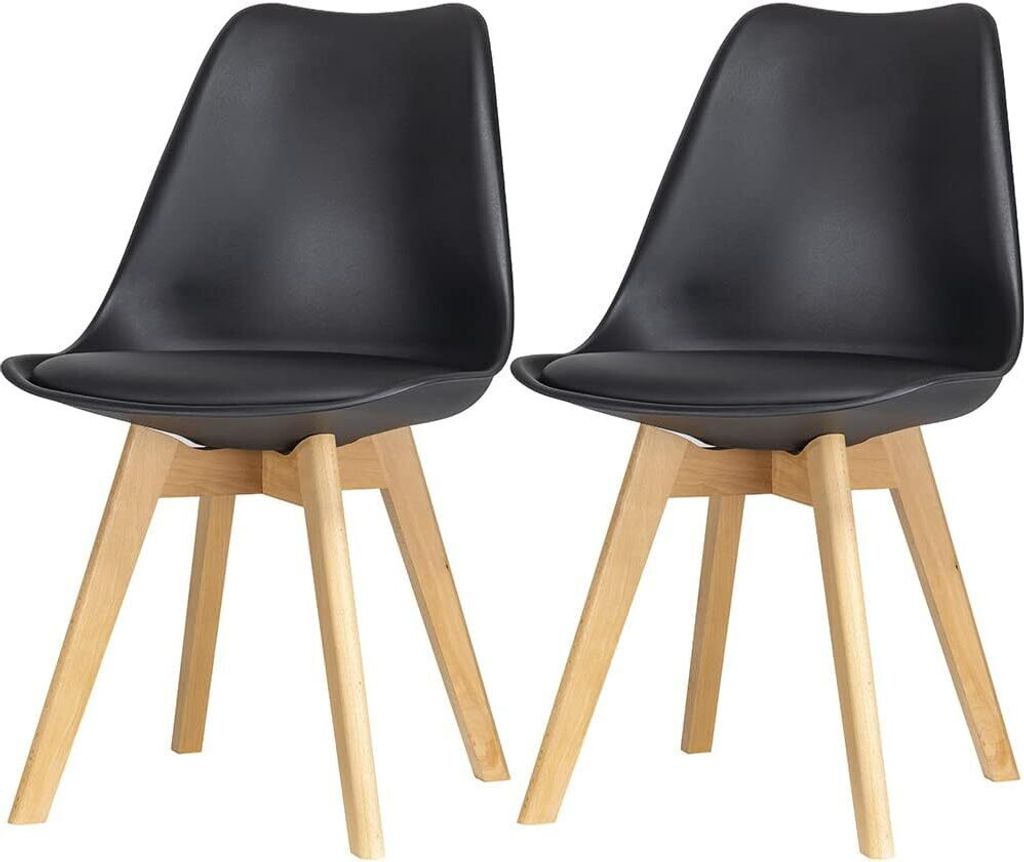 Two black dining chairs with wooden legs are shown against a white background.
