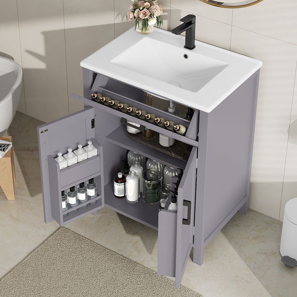 A bathroom vanity with a sink and storage compartments.