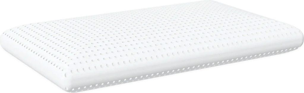 A white pillow with a perforated surface is shown against a white background.