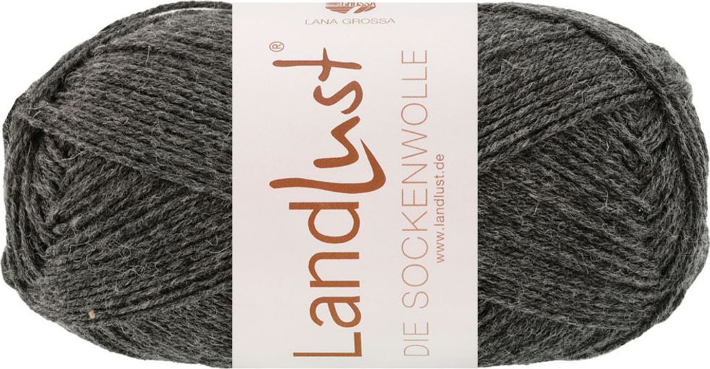 A ball of grey yarn with a label.