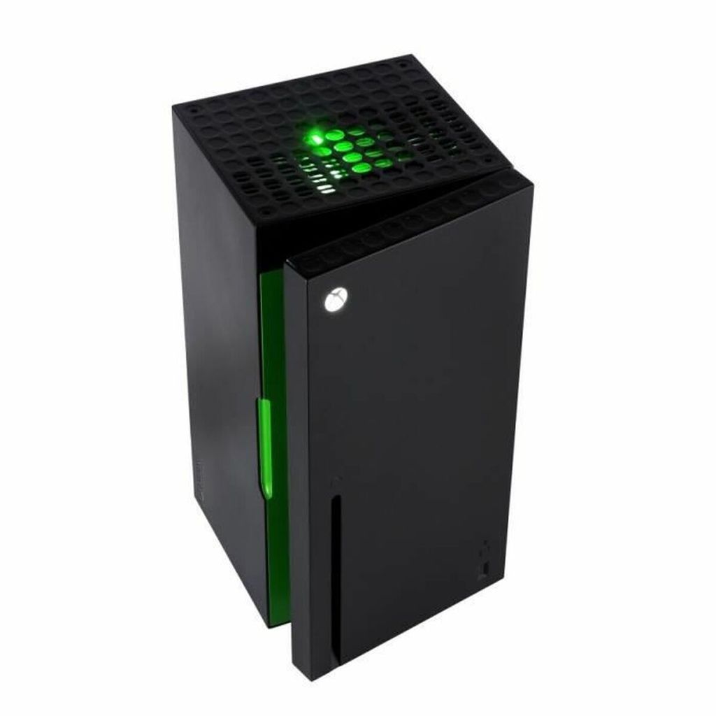 A black Xbox Series X replica mini-fridge with a green accent is shown against a white background. The top of the fridge has green LEDs and a ventilation grille, and the front door is slightly ajar, revealing more green interior.