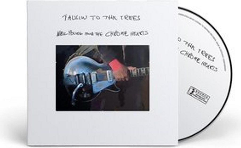 A white softpak CD case with a picture of a person playing a guitar and the CD itself is visible.