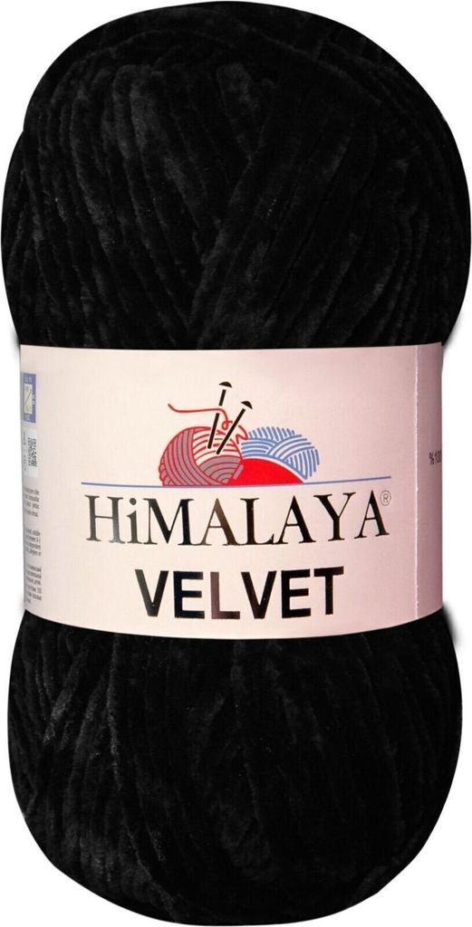 A ball of black velvet yarn on a white background.