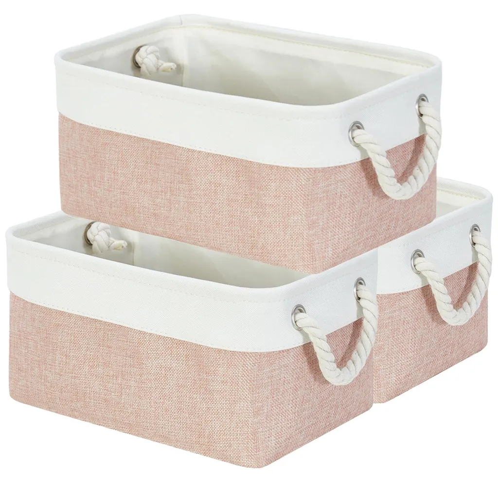 Petit bac de rangement en tissu rose pastel avec poignées robustes