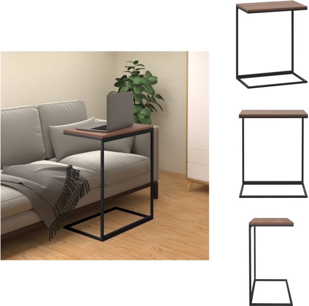 A side table with a laptop on it next to a sofa.