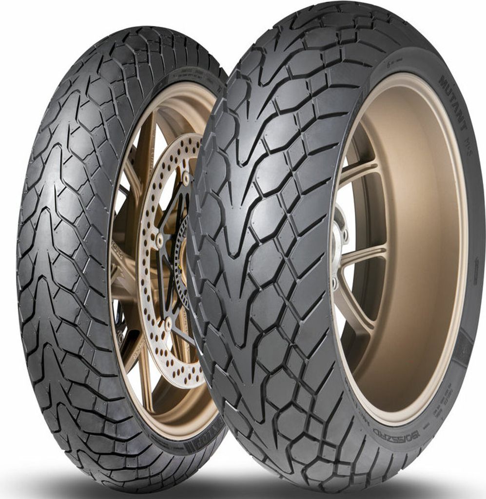 Two motorcycle tires are shown against a white background. One tire is in the foreground and the other is slightly behind it.