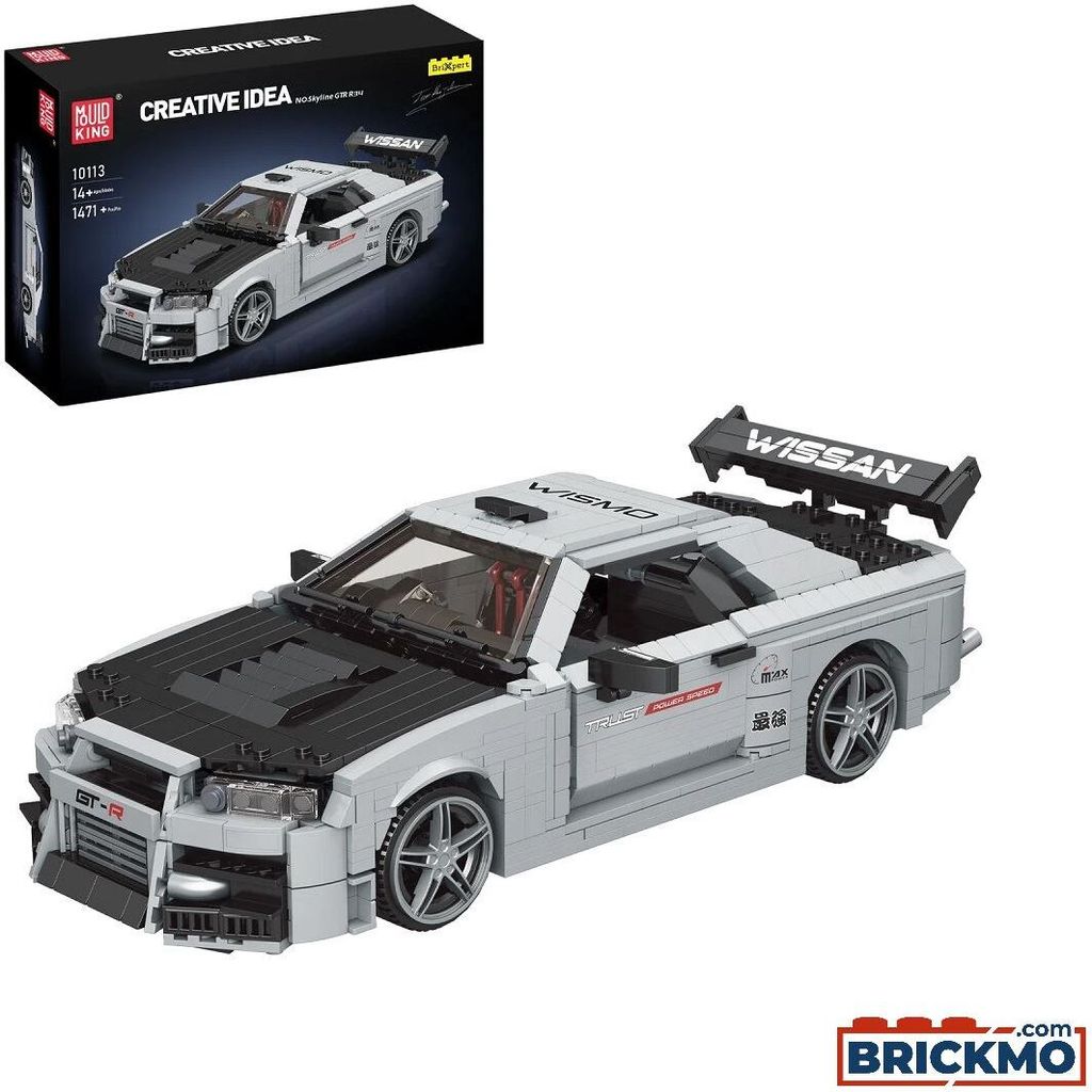 A model car kit of a Nissan Skyline GTR R34 is shown next to its packaging.